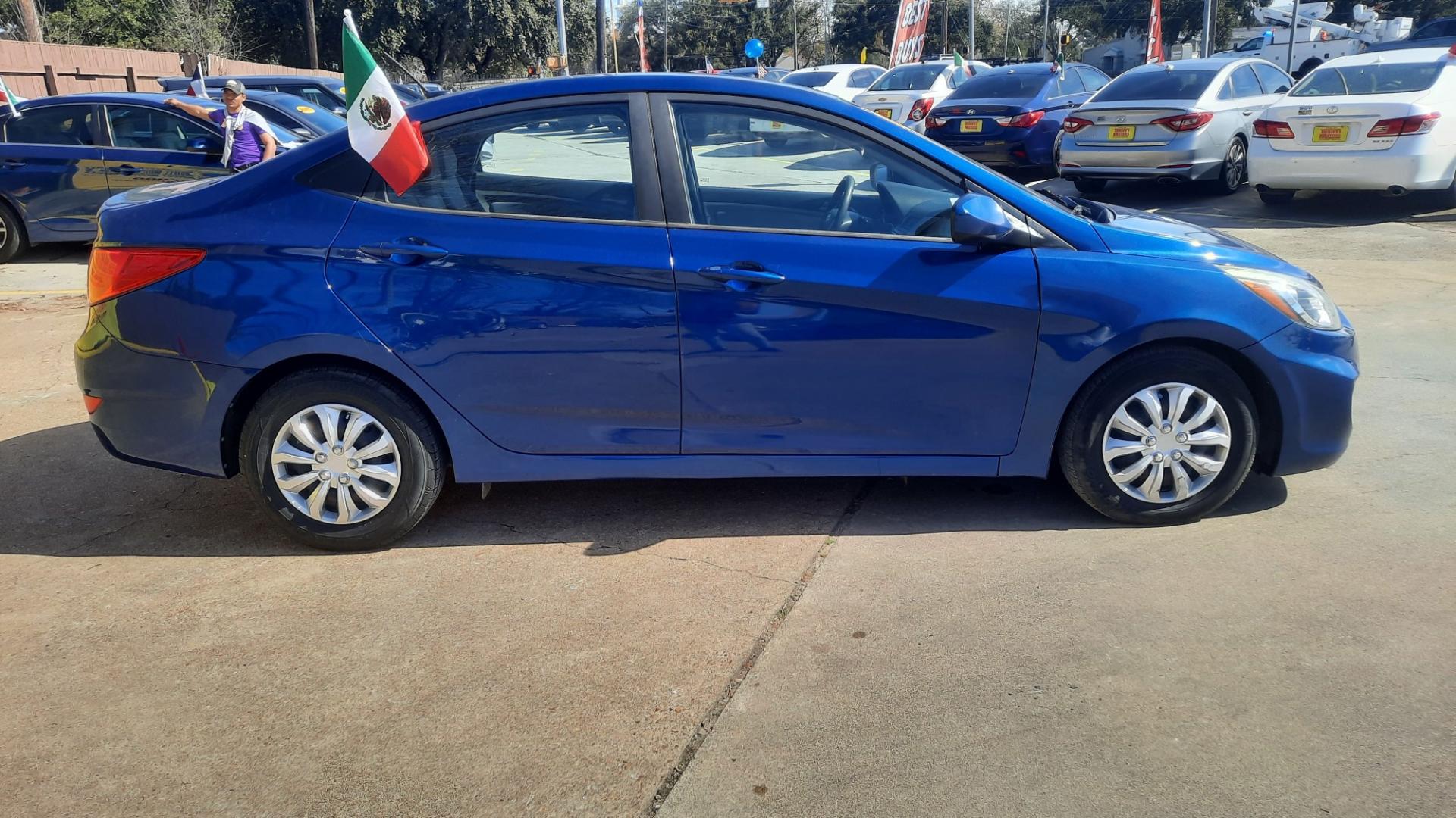 2017 Blue /Gray Hyundai Accent SE 4-Door 6M (KMHCT4AE1HU) with an 1.6L L4 DOHC 16V engine, Automatic 6-Speed transmission, located at 16710 Clay Rd., Houston, TX, 77084, (281) 859-7900, 29.834864, -95.656166 - Photo#2